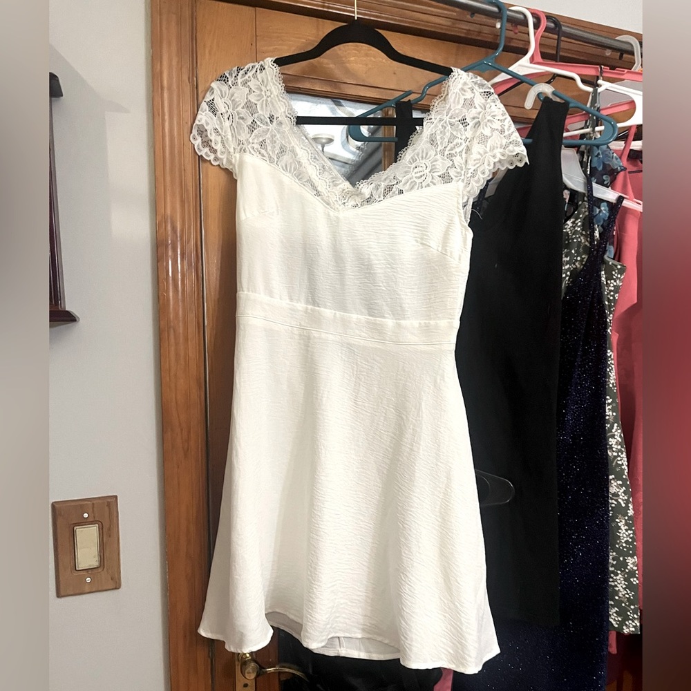 New white mini loose fit dress with tags (medium) from SHEIN.